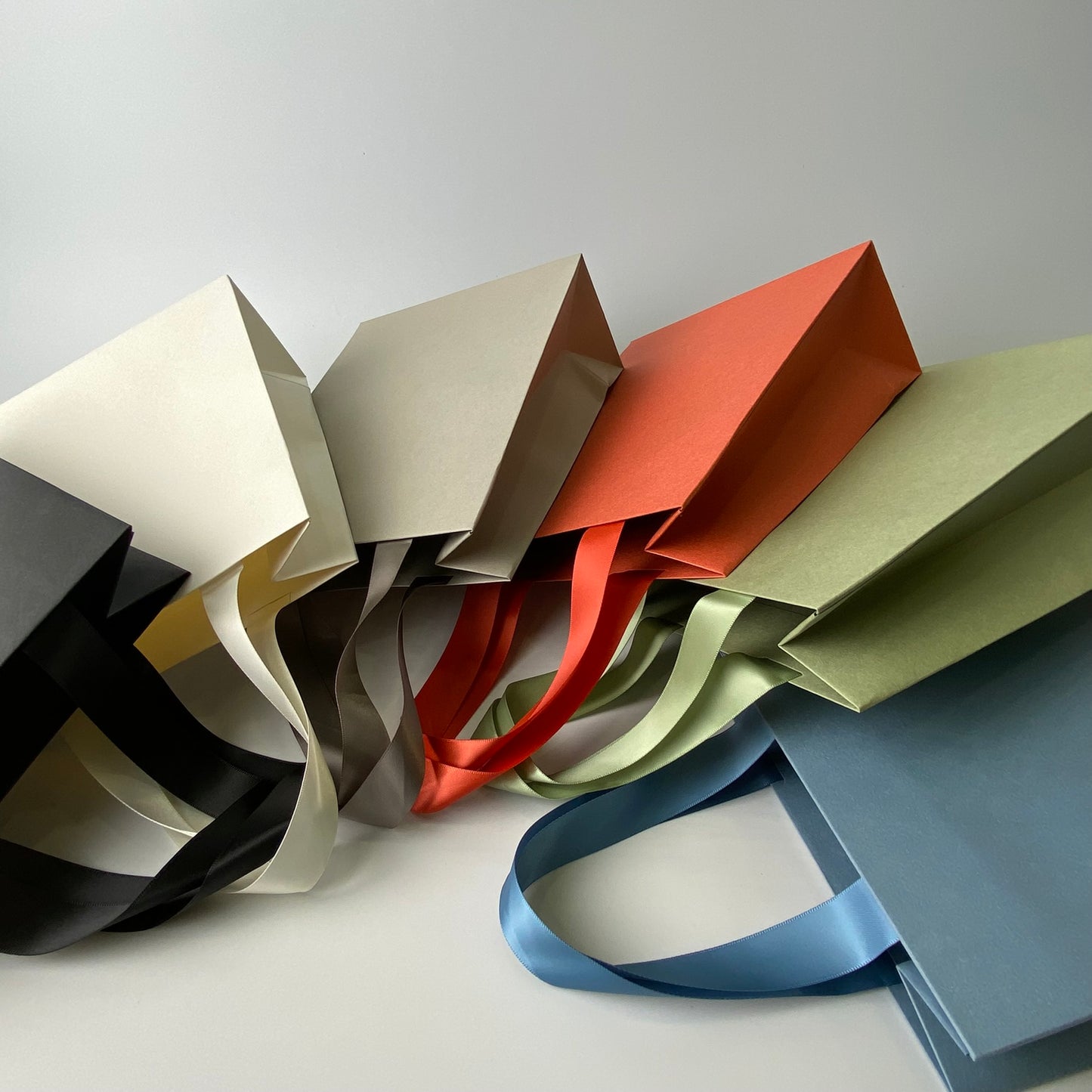 Set of 50 Premium Multicolor Paper Bags (18x22x8cm) – Handcrafted Satin Ribbon Handles