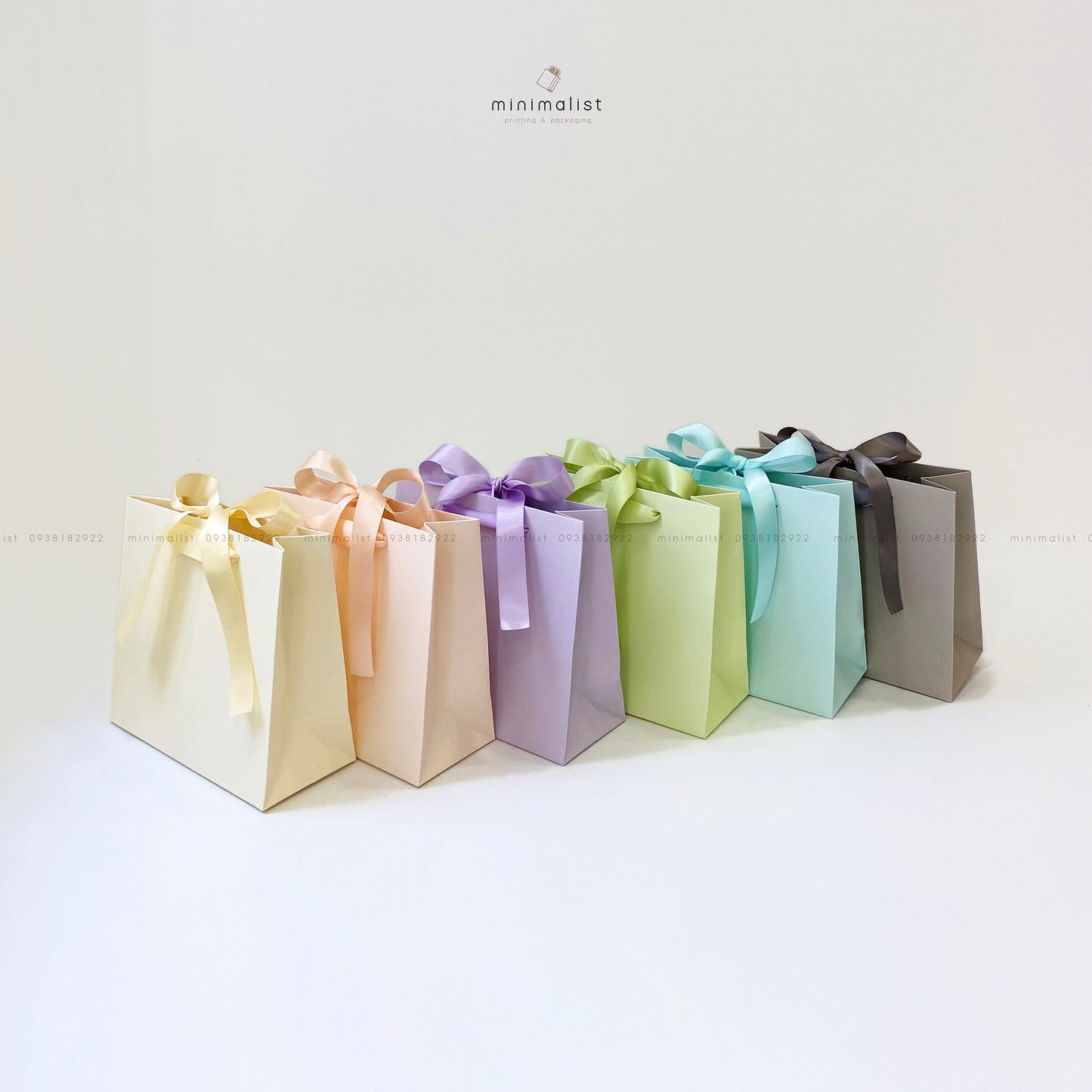 Set of 50 Multicolor Kraft Paper Bags (18x16x7.5cm) – Ribbon Handle with Punched Holes